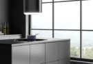 Modern Kitchen Design with a White and Black Range Hood for a Stylish Look